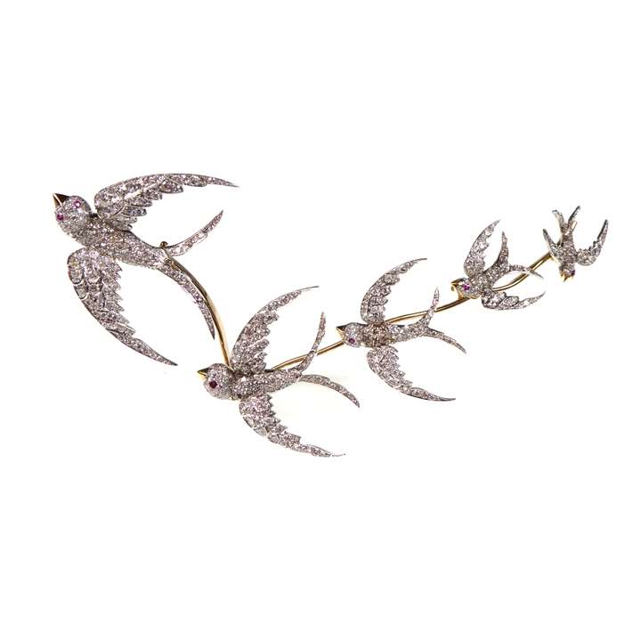 Diamond set tremblant brooch with graduated swallow birds